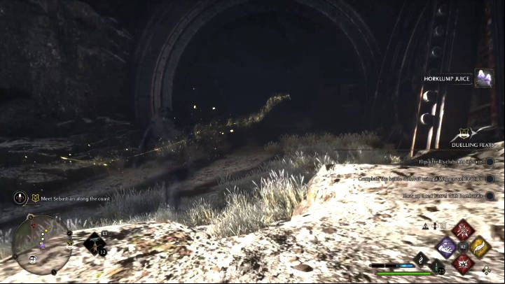 To reach the coast, you'll have to go through a tunnel that leads to a new area of the world map - Hogwarts Legacy: In the Shadow of the Mountain - Main quests - Hogwarts Legacy Guide