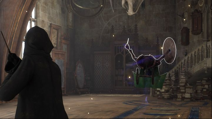During the class, you will learn the Levioso spell - complete the mini-game by following the cursor along the path shown on the screen (press the X/A button when needed) - Hogwarts Legacy: Defence Against the Dark Arts Class - Main quests - Hogwarts Legacy Guide
