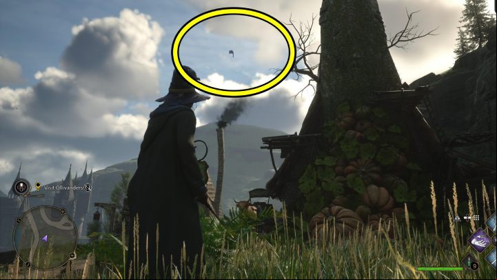One of the Flying Guide Pages #7 (Hogsmeade) is circling around the chimney of the herb shop - Hogwarts Legacy: Field Guide Pages - Hogsmeade - Hogsmeade - Hogwarts Legacy Guide