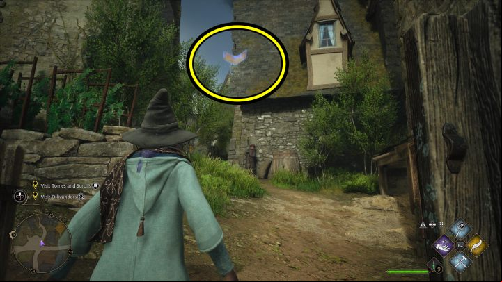 This Flying Guide Page #9 (Hogsmeade) is between the small houses next to Ollivander's wand shop - Hogwarts Legacy: Field Guide Pages - Hogsmeade - Hogsmeade - Hogwarts Legacy Guide