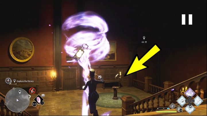 While carrying the lantern, go down the stairs and place it on the stand - Hogwarts Legacy: Minding Your Own Business - Hogsmeade - Hogwarts Legacy Guide