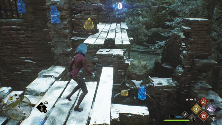 Interact with the statue next to the door on the right and continue forward - Hogwarts Legacy: Ancient Magic Hotspots Part 1 - Highlands - Hogwarts Legacy Guide