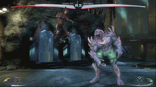 On the left side of the arena there are Batmans suits in glass showcases - Injustice Gods Among Us: Batcave, arena guide - Arenas - Injustice: Gods Among Us Game Guide