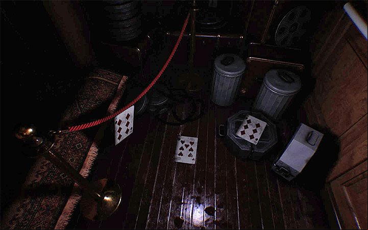 Look around the area and find the three playing cards lying on the floor - as shown in the image above - The third puzzle with a padlock | Layers of Fear 2 Riddle Solutions - Act 4 - Breathe - Layers of Fear 2 Guide