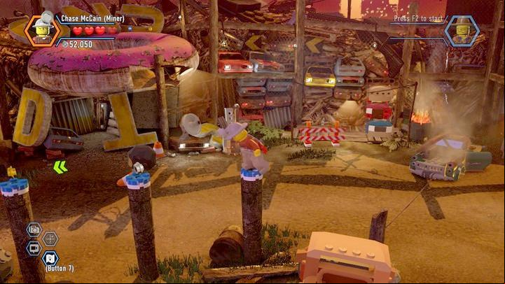 From the vehicle, jump over onto the pillar and walk over near the plane - The Scrapyard | Walkthrough - Chapter 8 - LEGO City: Undercover Game Guide
