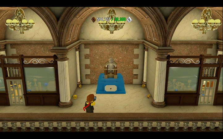 Paint the statue on the first floor and you will gain access to doors on both sides - Secrets in the bank | Walkthrough - Chapter 6 - LEGO City: Undercover Game Guide