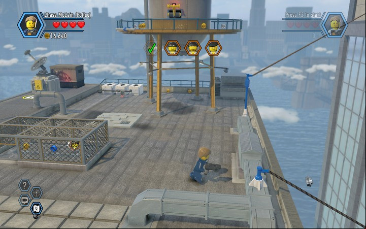 Jump onto the rope to get to the next building - The TV station building | Chapter 2 - Chapter 2 - LEGO City: Undercover Game Guide