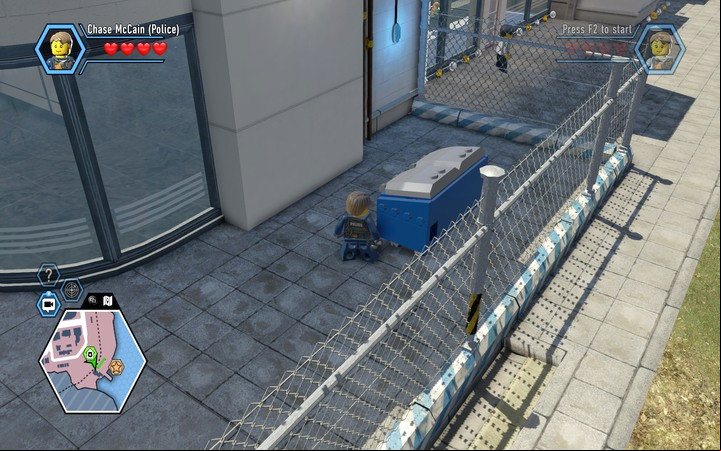 The garbage cans in the blue and white colour are often used as a safeguard in order to through the fence - The prison island | Chapter 3 - Chapter 3 - LEGO City: Undercover Game Guide
