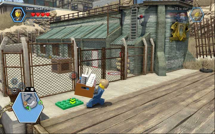 Take the box and put it on the green plate - The prison island | Chapter 3 - Chapter 3 - LEGO City: Undercover Game Guide