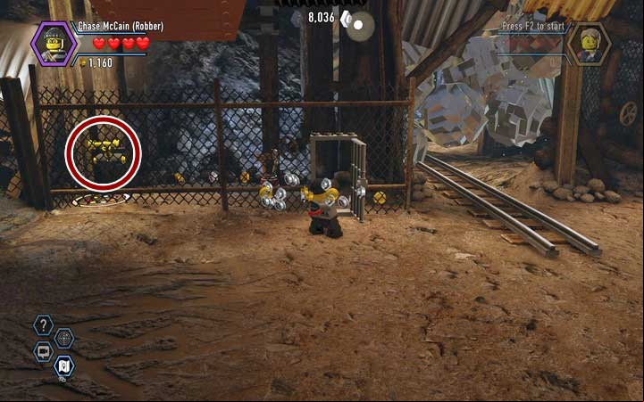 Use the yellow lever behind the fence, in order to get the blocks to build a box - The Bluebell Mine | Chapter 3 - Chapter 3 - LEGO City: Undercover Game Guide