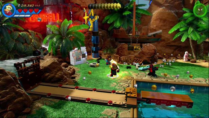 Move to the center of the location (see the picture) and use Howard the Duck to destroy the silver container - Mission 10 - Pool Party | Gwenpools missions (the pink bricks) - Gwenpools missions - LEGO Marvel Super Heroes 2 Game Guide