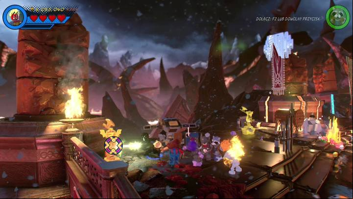 The third Minikit will be yours, once you destroy five golden statues (presented in the screenshot) - Mission 7 - Surtur-n Doom | Mission secrets - Mission secrets - LEGO Marvel Super Heroes 2 Game Guide