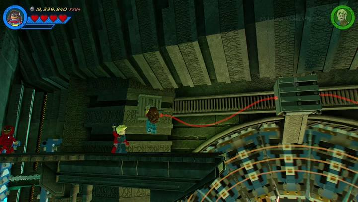 On the balconies above you will find two handles placed on opposite sides - Mission 14 - Halo, is it Kree Youre Looking For | Mission secrets - Mission secrets - LEGO Marvel Super Heroes 2 Game Guide