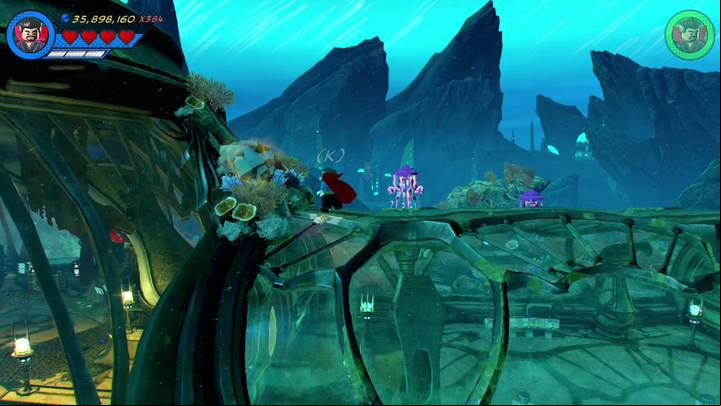 Once you collect minikit number seven, jump on the glass cover/tunnel from which you came in - Mission 16 - Torg-Nado | Mission secrets - Mission secrets - LEGO Marvel Super Heroes 2 Game Guide