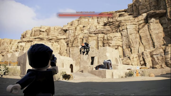 Shoot down the droid attacking the inhabitants and deliver it to the quest giver - LEGO Skywalker Saga: Probes and Cons - walkthrough - Tatooine - the desert of Jundland - LEGO Skywalker Saga Guide