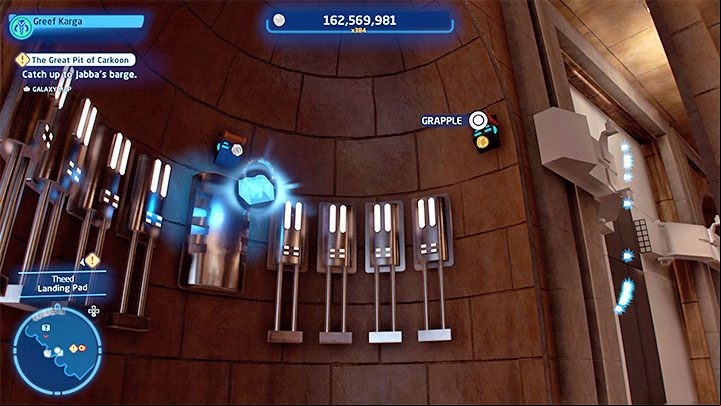 The collectible you are looking for is levitating high up in the air near one of the hangar walls - LEGO Skywalker Saga: Theed - list of all puzzles - Naboo - LEGO Skywalker Saga Guide