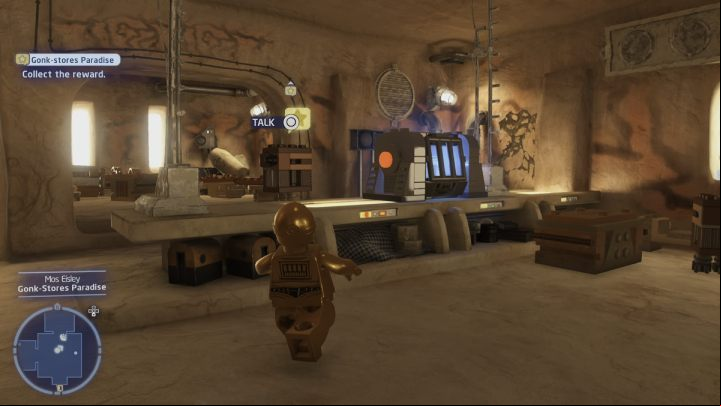 Once Gonker reaches his destination, switch characters once again and talk to him as a protocol droid - LEGO Skywalker Saga: Gonk-stores Paradise - walkthrough - Tatooine - Mos Eisley - LEGO Skywalker Saga Guide