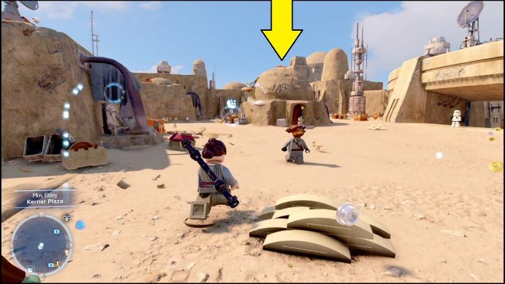 This brick is locked in a chest, in the south-western part of the map - LEGO Star Wars The Skywalker Saga: Mos Eisley - list of all puzzles - Tatooine - LEGO Skywalker Saga Guide