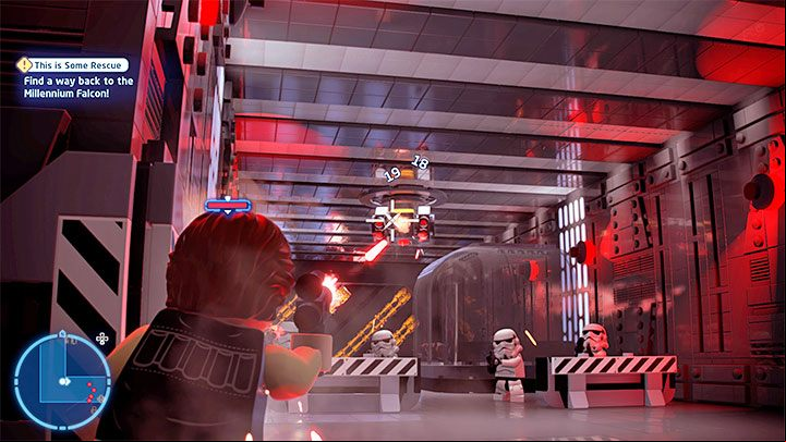 The officer is hiding around the corner, and apart from the new regular enemies, you also have to watch out for the turret near the ceiling - LEGO Skywalker Saga: This is Some Rescue - walkthrough - Episode 4 - A New Hope - LEGO Skywalker Saga Guide