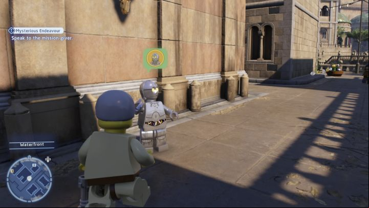 To start the mission, you need to talk to the protocol droid near the river in Theed - LEGO Skywalker Saga: Mysterious Endeavor - walkthrough - Naboo - Theed - LEGO Skywalker Saga Guide