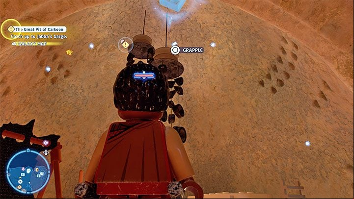 Switch to any character that can pull itself to the hooks - LEGO Skywalker Saga: Tuanul Village - list of all puzzles - Jakku - LEGO Skywalker Saga Guide