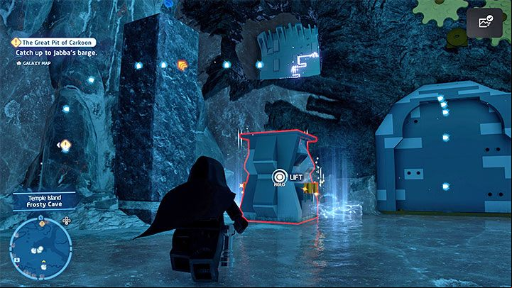 You can reach the second cog by grabbing the chest from one of the upper shelves and placing it in the slot shown in the picture - LEGO Skywalker Saga: Temple Island - list of all puzzles - Ahch-To - LEGO Skywalker Saga Guide