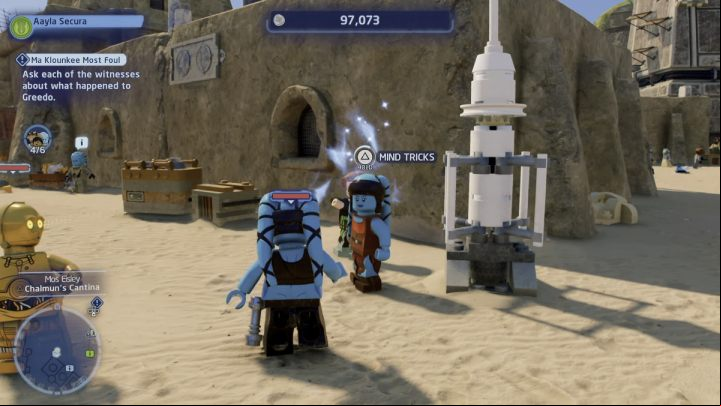 While controlling any Jedi character, approach the character from the hologram, who will be standing near the house, by the white rocket - LEGO Skywalker Saga: Ma Klounkee Most Foul - walkthrough, description - Tatooine - Mos Eisley - LEGO Skywalker Saga Guide