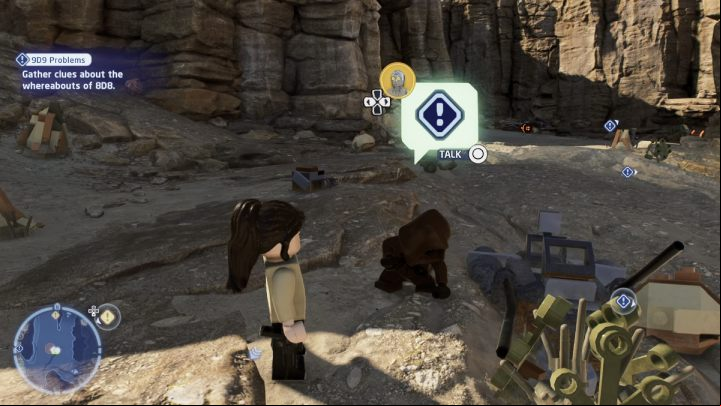 Follow the marker to the first search area and, while controlling the protocol droid, talk to the NPC standing by the small vehicle and plants - LEGO Skywalker Saga: 9D9 Problems - walkthrough - Tatooine - the desert of Jundland - LEGO Skywalker Saga Guide