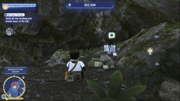 The second droid is hiding in a small cave, which you can enter through the stone stairs at the edge of the map - LEGO Skywalker Saga: No Way Toojay - walkthrough - Ajan Kloss - resistance camp - LEGO Skywalker Saga Guide
