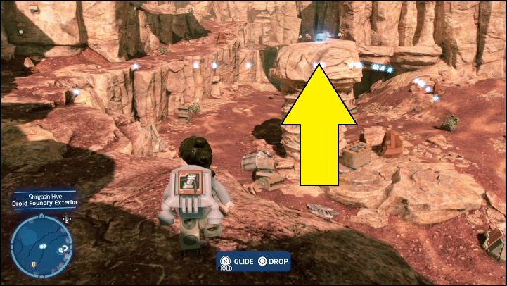 You can reach this collectible with a glider-equipped Scavenger or a jetpack-equipped character, such as Boba Fett - LEGO Skywalker Saga: Stalgasin Hive - list of all puzzles - Geonosis - LEGO Skywalker Saga Guide