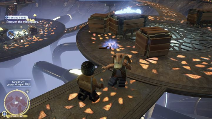 Go down to the lower level of the city and pick up the key from the crates and the shaky Gungan - LEGO Skywalker Saga: Seeking Seeds - walkthrough - Jakku - Tuanul Village - LEGO Skywalker Saga Guide