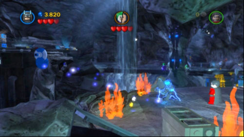 After a short animation with Joker move to the left, use bricks to build hole for the pole and jump on the little rock on the left - Unwelcome Guests | Walkthrough - Walkthrough - LEGO Batman 2: DC Super Heroes Game Guide & Walkthrough