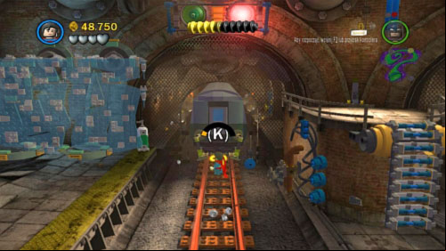 Use pistol to destroy blue bricks blocking the ladder near wall - Underground Retreat | Walkthrough - Walkthrough - LEGO Batman 2: DC Super Heroes Game Guide & Walkthrough