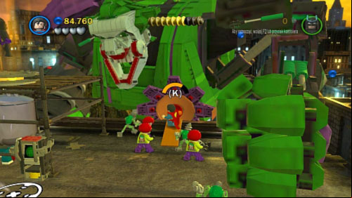 At the end go to the golden handle and pull it (picture) - The Next President | Walkthrough - Walkthrough - LEGO Batman 2: DC Super Heroes Game Guide & Walkthrough