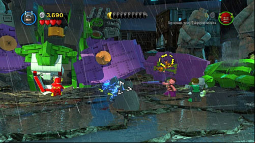 After explosion use Wonder Womans whip or Batmans hook on two handles which will show on the arm of the robot (picture) - Heroes Unite | Walkthrough - Walkthrough - LEGO Batman 2: DC Super Heroes Game Guide & Walkthrough