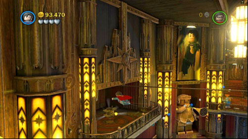 #08 - In this same location fly to the balcony on the right side and destroy red cylinder - Theatrical Pursuits | Minikits - Minikits - LEGO Batman 2: DC Super Heroes Game Guide & Walkthrough