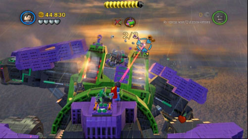 #10 - After destroying the first shoulder-blade three cannons will show up - Down to Earth | Minikits - Minikits - LEGO Batman 2: DC Super Heroes Game Guide & Walkthrough