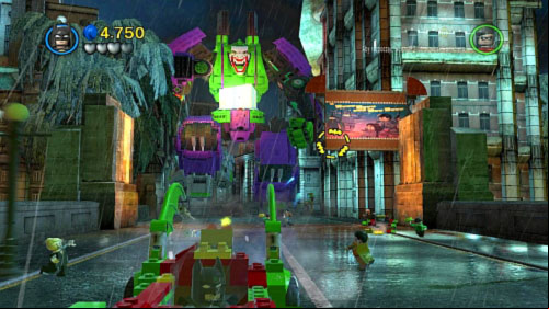 #02 - At the beginning of the chase you will see an ment of the film on the building - destroy it - Core Instability | Minikits - Minikits - LEGO Batman 2: DC Super Heroes Game Guide & Walkthrough