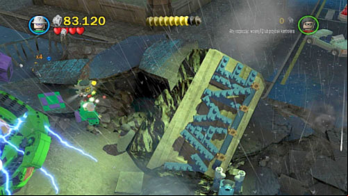 #03 - On the right side of electric machine (right side of the location) there is a mark on the ground - Heroes Unite | Minikits - Minikits - LEGO Batman 2: DC Super Heroes Game Guide & Walkthrough