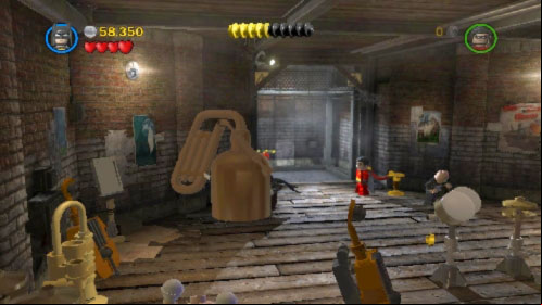 When you get to the basement destroy big gold instrument on the left (picture) where Riddler is hiding - Theatrical Pursuits | Walkthrough - Walkthrough - LEGO Batman 2: DC Super Heroes Game Guide & Walkthrough