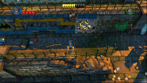 Start heading forward and use rocket launcher to destroy big statue standing on the wall to your right - Arkham Asylum Antics | Walkthrough - Walkthrough - LEGO Batman 2: DC Super Heroes Game Guide & Walkthrough