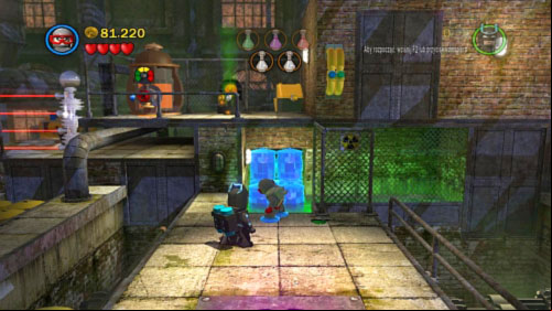 Use magnesium on blue containers in the background (picture) and use to leap on the higher platform where you will find another samples of chemicals - Chemical Crisis | Walkthrough - Walkthrough - LEGO Batman 2: DC Super Heroes Game Guide & Walkthrough