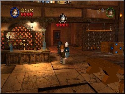 When you will do it, a man behind the bar will start to shoot at you - Chapter 2 - Into the Mountains - part 1 - Riders of the Lost Ark - LEGO Indiana Jones: The Original Adventures - Game Guide and Walkthrough