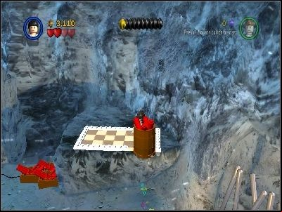 Using Marion jump on the ledge in the highlighted place and push down the box with TNT - Chapter 2 - Into the Mountains - part 1 - Riders of the Lost Ark - LEGO Indiana Jones: The Original Adventures - Game Guide and Walkthrough