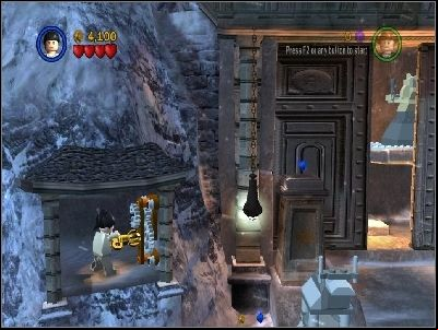 Jump with Marion on the ledge and use the mechanism which will open the gate - Chapter 2 - Into the Mountains - part 2 - Riders of the Lost Ark - LEGO Indiana Jones: The Original Adventures - Game Guide and Walkthrough