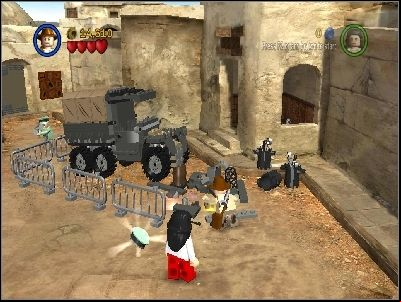 On the other side defeat your enemies and repair the truck using LEGO pieces - Chapter 3 - City of Danger - part 2 - Riders of the Lost Ark - LEGO Indiana Jones: The Original Adventures - Game Guide and Walkthrough