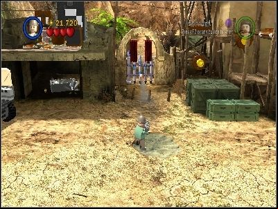Take a rocket launcher from the room and destroy the blue gate to the right with it - Chapter 6 - Opening the Ark - Riders of the Lost Ark - LEGO Indiana Jones: The Original Adventures - Game Guide and Walkthrough