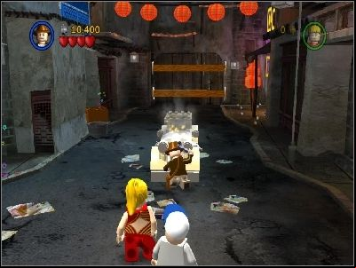 You will notice, that the gate to the garage is opening - Chapter 1 - Shanghai Showdown - The Temple of Doom - LEGO Indiana Jones: The Original Adventures - Game Guide and Walkthrough