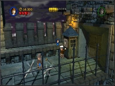 Go to the other side, defeat your enemies, take new hat and knock to the outpost - Chapter 2 - Castle Rescue - The Last Crusade - LEGO Indiana Jones: The Original Adventures - Game Guide and Walkthrough