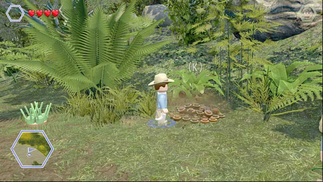 As Grant, walk to the pile of ground and dig up a blue brick from it - Brachiosaurus Plains | Jurassic Park - secrets in free roam - Jurassic Park - secrets in free roam - LEGO Jurassic World Game Guide & Walkthrough